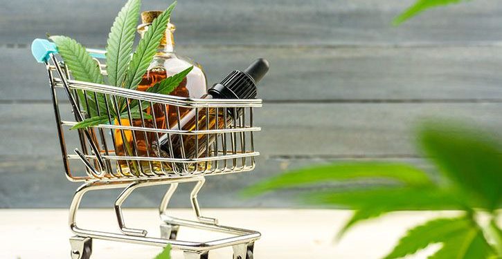 CBD oil and cannabis products in a shopping cart