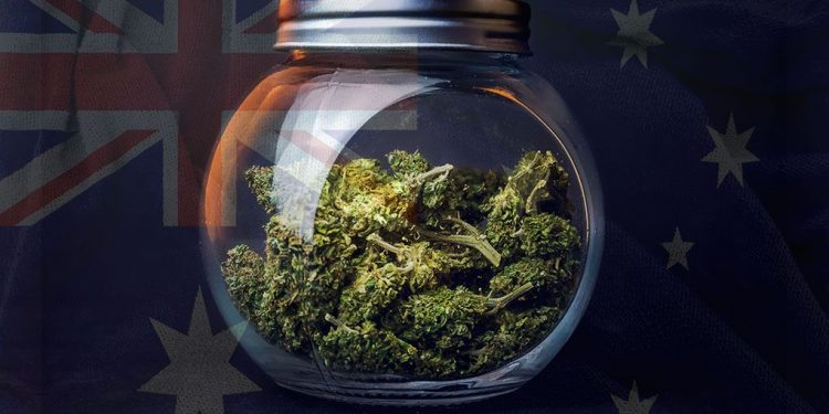 Jar of cannabis over an Australian flag